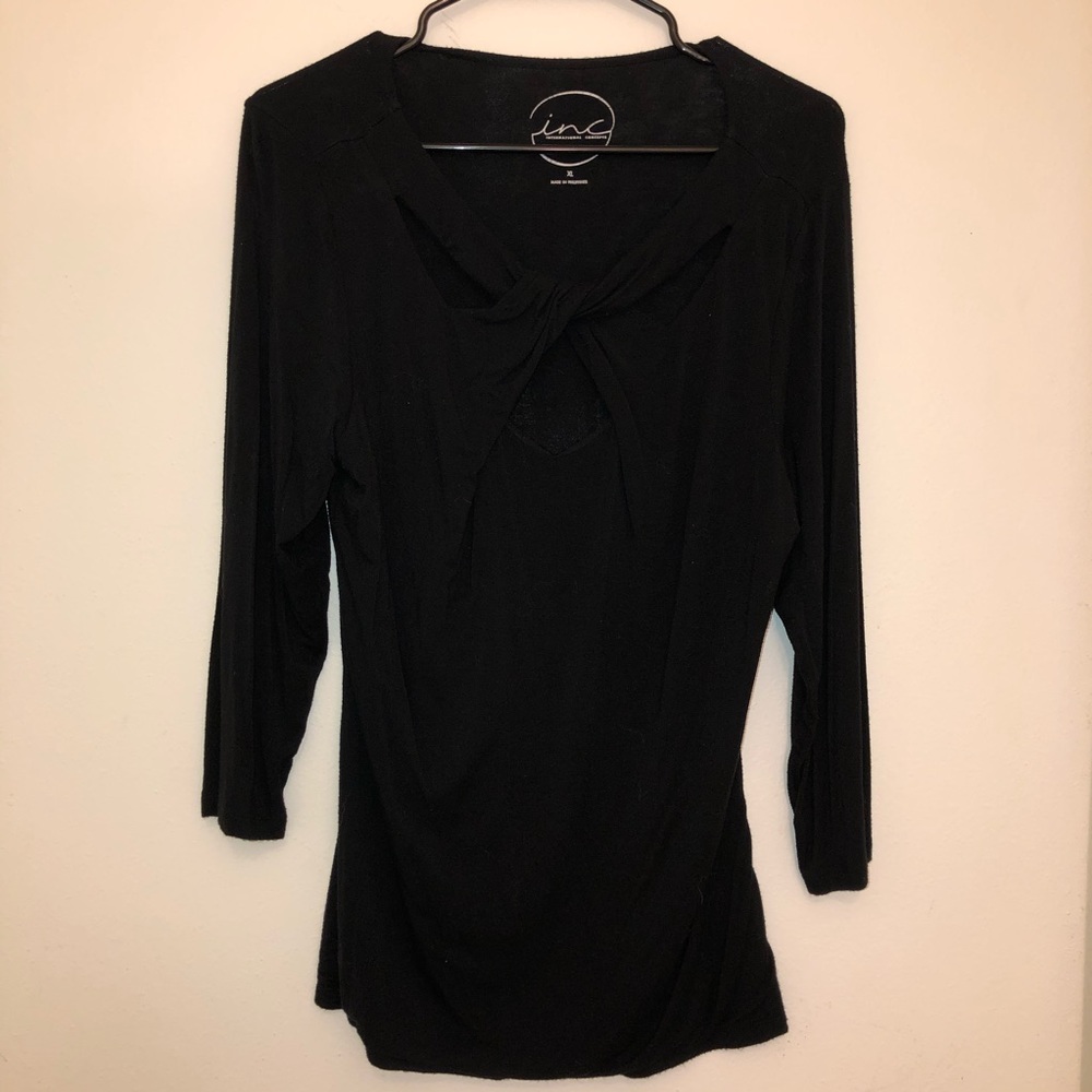Cute top with crisscross detailing!